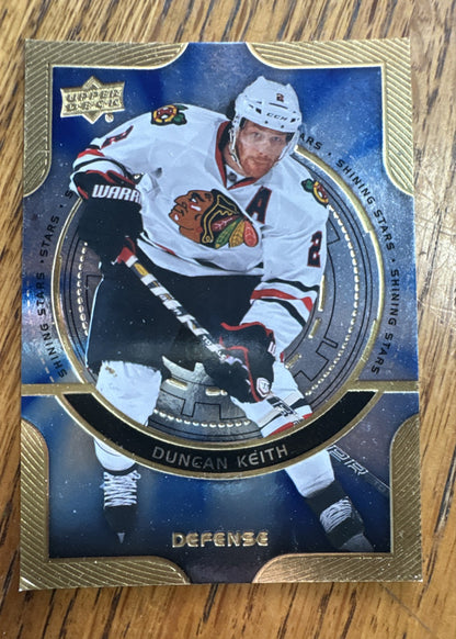 2013-14 Upper Deck - Shining Stars Defense Duncan Keith #D5