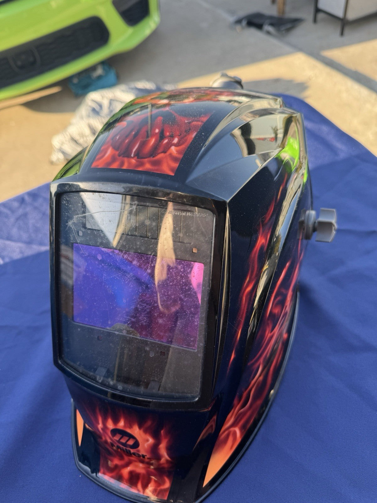Miller Elite Welding Helmet with manual and extra lenses, new batteries